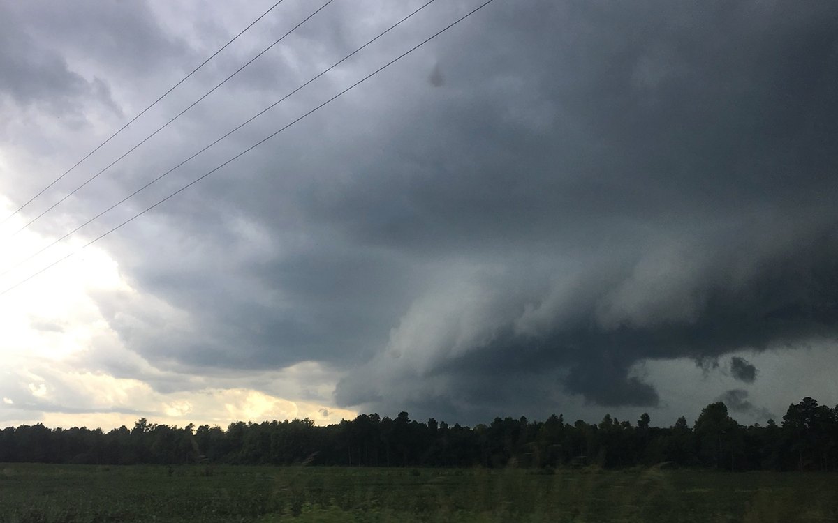 Shelf cloud over an open field